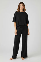 Plaza d'Amanté black relaxed fit lounge set with oversized crewneck t-shirt and wide-leg drawstring trousers