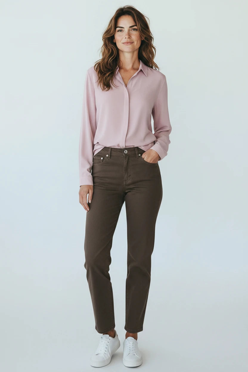 Plaza d'Amanté women's straight-leg brown trousers paired with a light pink button-down shirt and white sneakers
