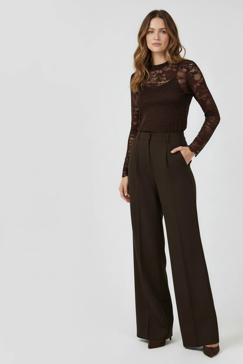 Plaza d'Amanté chocolate brown lace long-sleeve top and high-waisted wide-leg tailored trousers on a female model