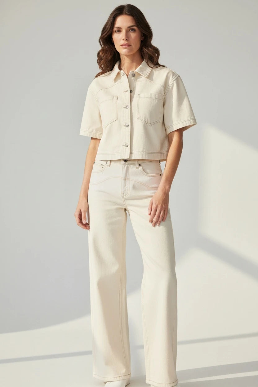 Plaza d'Amanté cream denim co-ord set featuring a short-sleeve button-down shirt and high-waisted wide-leg trousers.