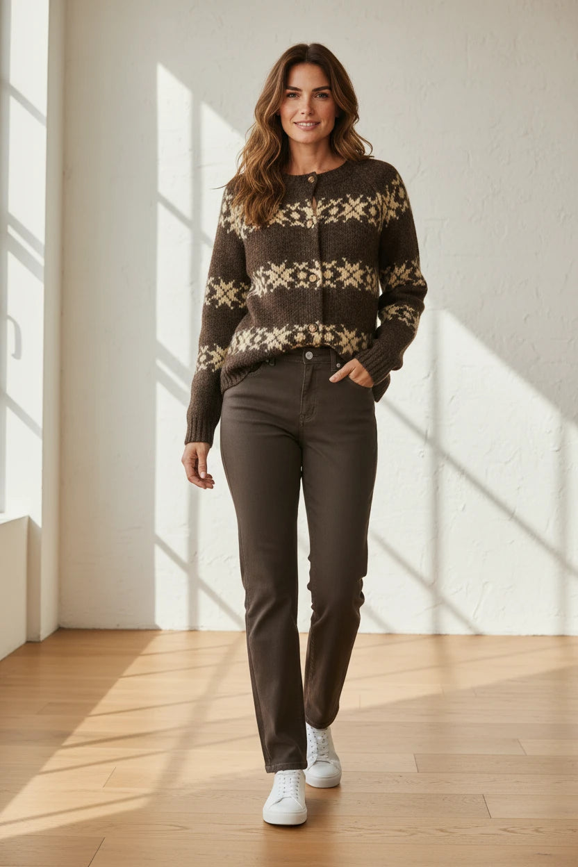 Plaza d'Amanté brown and cream Fair Isle button-front cardigan worn by a woman with dark jeans and white sneakers.