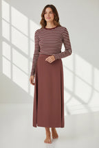 Plaza d'Amanté two-piece set with a burgundy and cream striped long-sleeve top and a solid mauve maxi skirt.